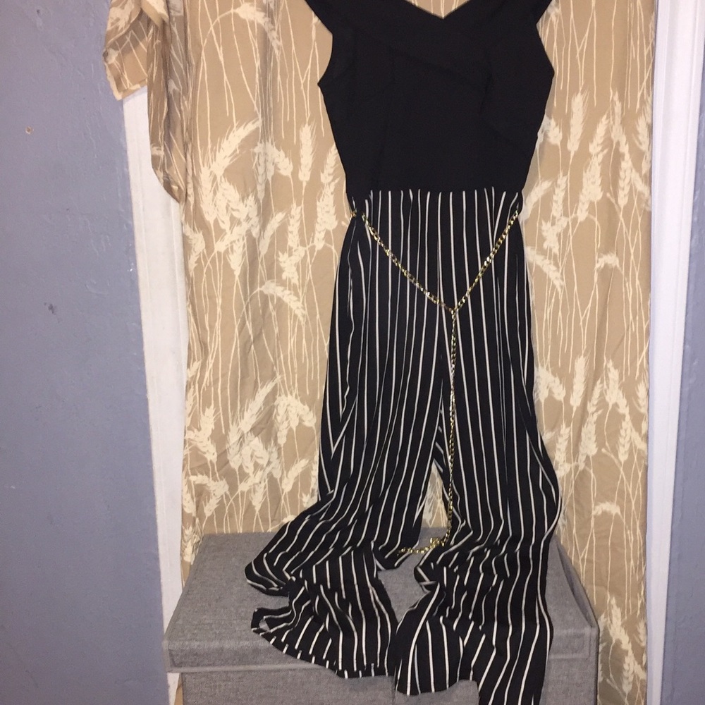 Black and white jumper.